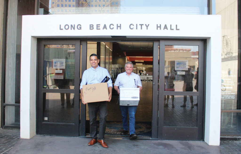 Mayor Robert Garcia and City Manager Pat West Leaving City Hall